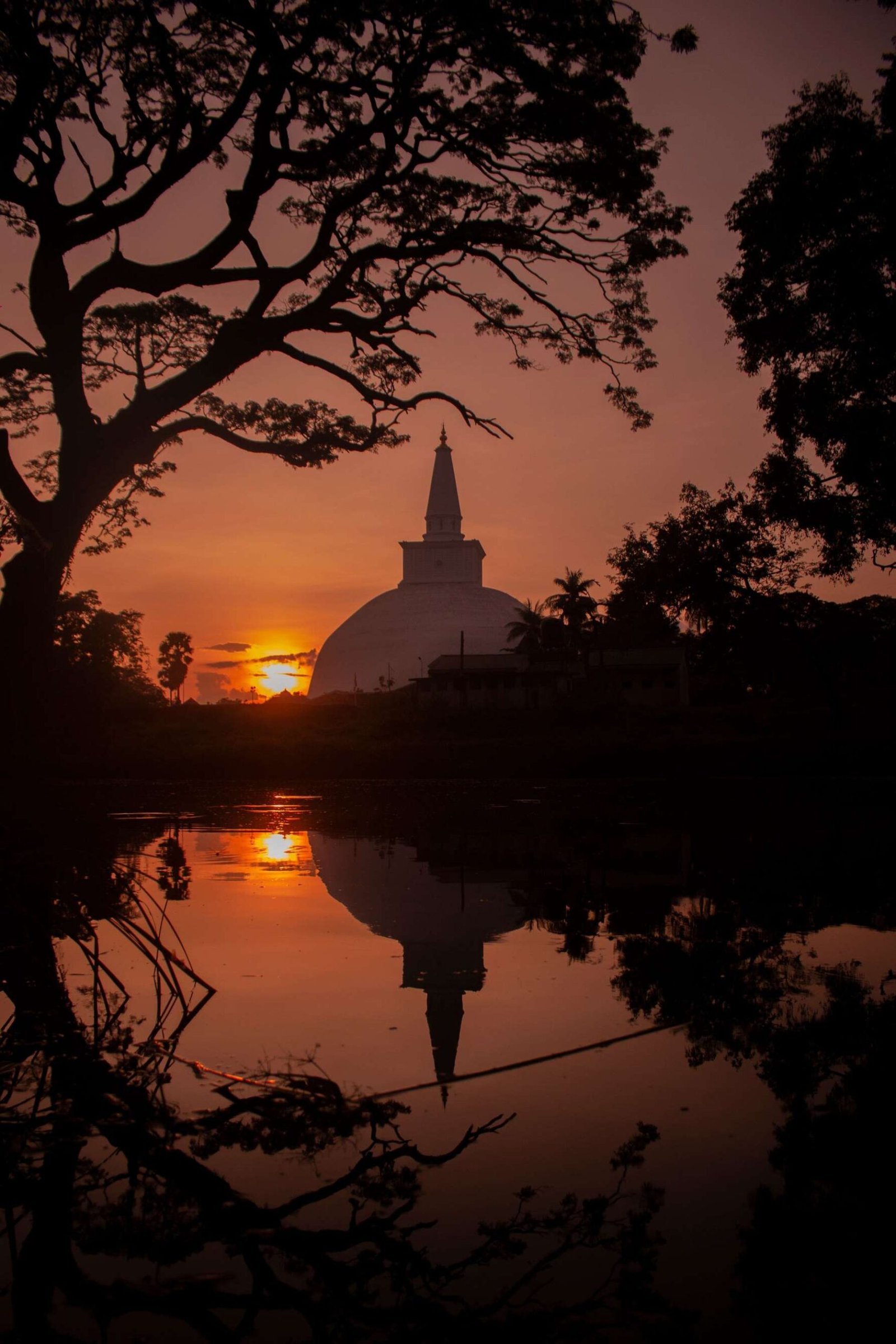 Ruwanweliseya stupa reflected at sunset, Anuradhapura
